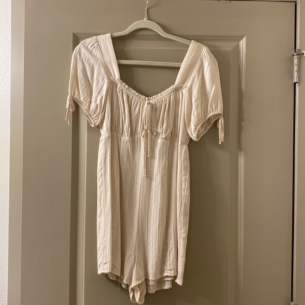 Cream romper, size small